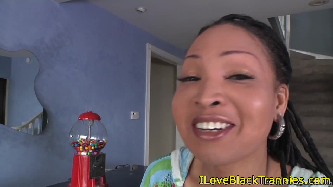 Ebony ts chick jerks her big cock